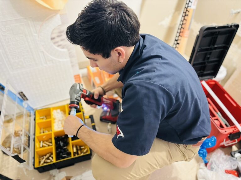 A plumber is in very serious vibes while working using his toolkit